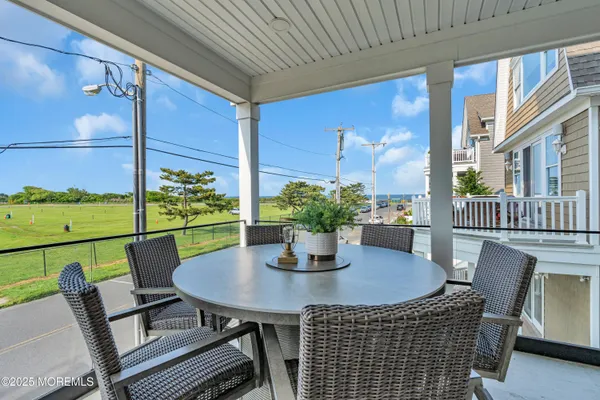 a view of a balcony with chair