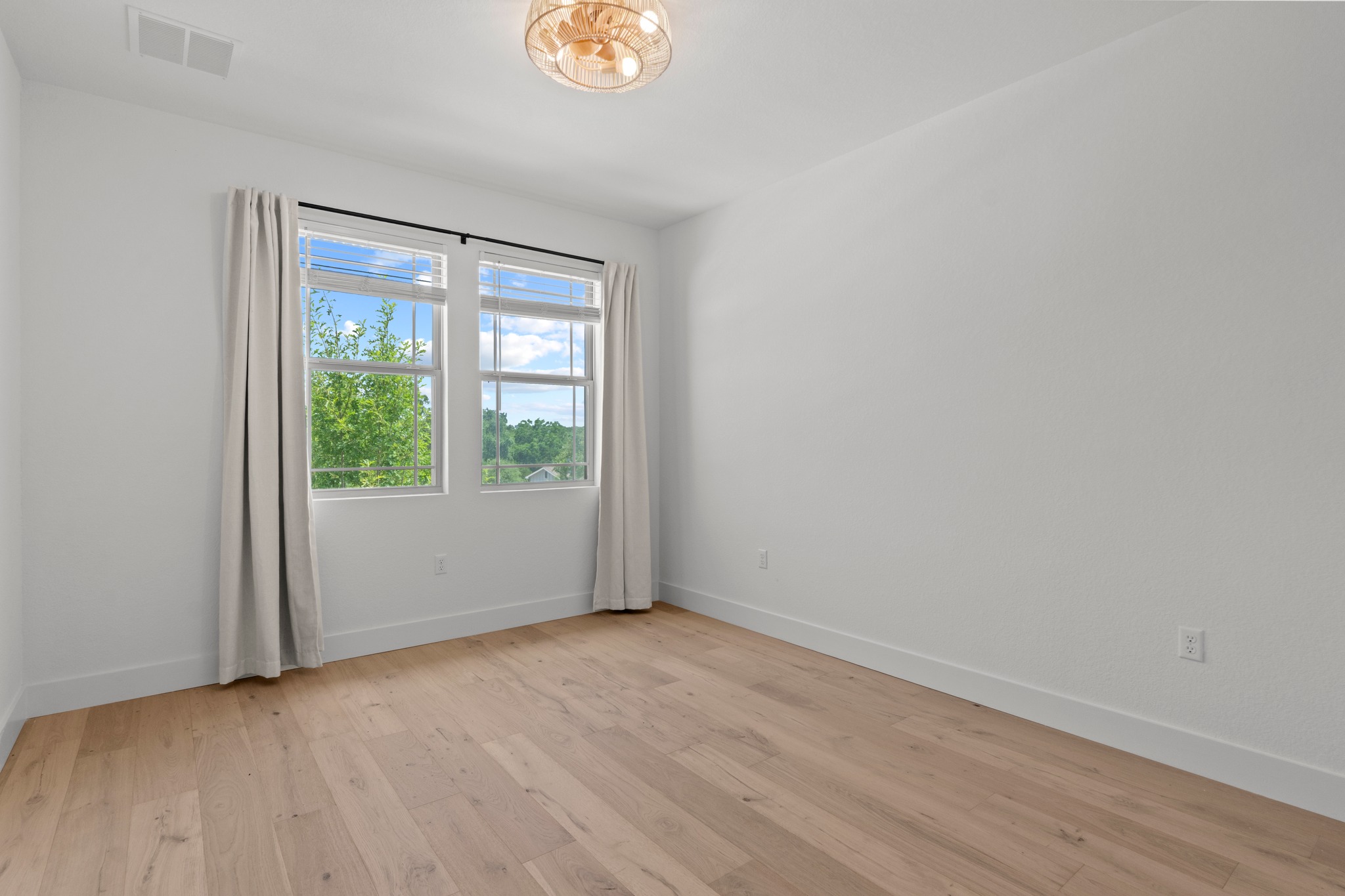 1101 Skeeter Cove Austin, TX 78748 - Photo 27 of 31 Well-lit room with wood floors offers versatility for your lifestyle.