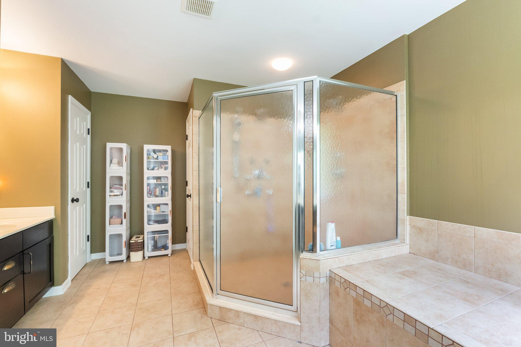 3230 Saber Road Huntingtown, MD 20639 - Photo 28 of 53 Primary Bathroom Walk in Shower & Double Vanities