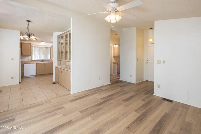 a view of a kitchen with a stove cabinets and wooden floor
