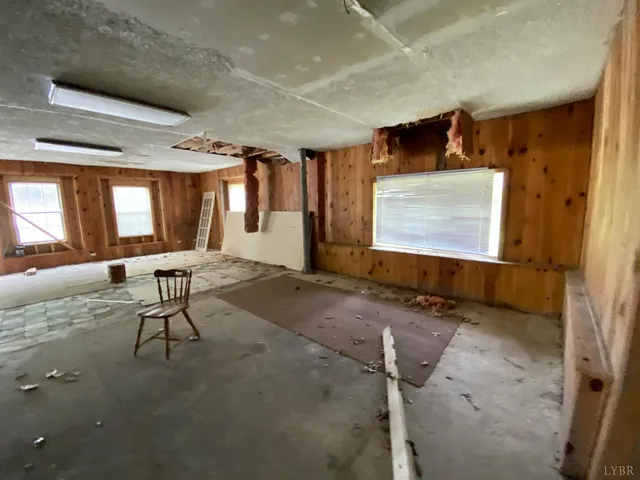 a bathroom with a tub and shower