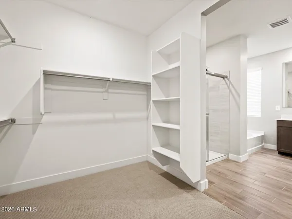 a view of an empty walk in closet