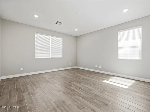 a view of a kitchen with a microwave and a stove