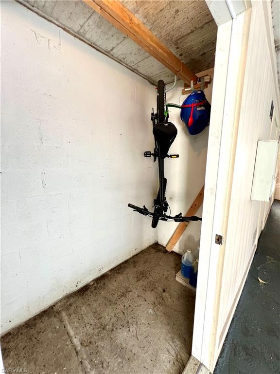 705 Augusta Boulevard, Unit 7059 Naples, FL 34113 - Photo 24 of 26 Carport storage locker