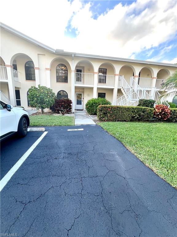 705 Augusta Boulevard, Unit 7059 Naples, FL 34113 - Photo 25 of 26 Deeded Parking Space# 1 in front of Building