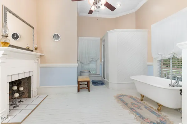 a bed room with a bed and a lamp