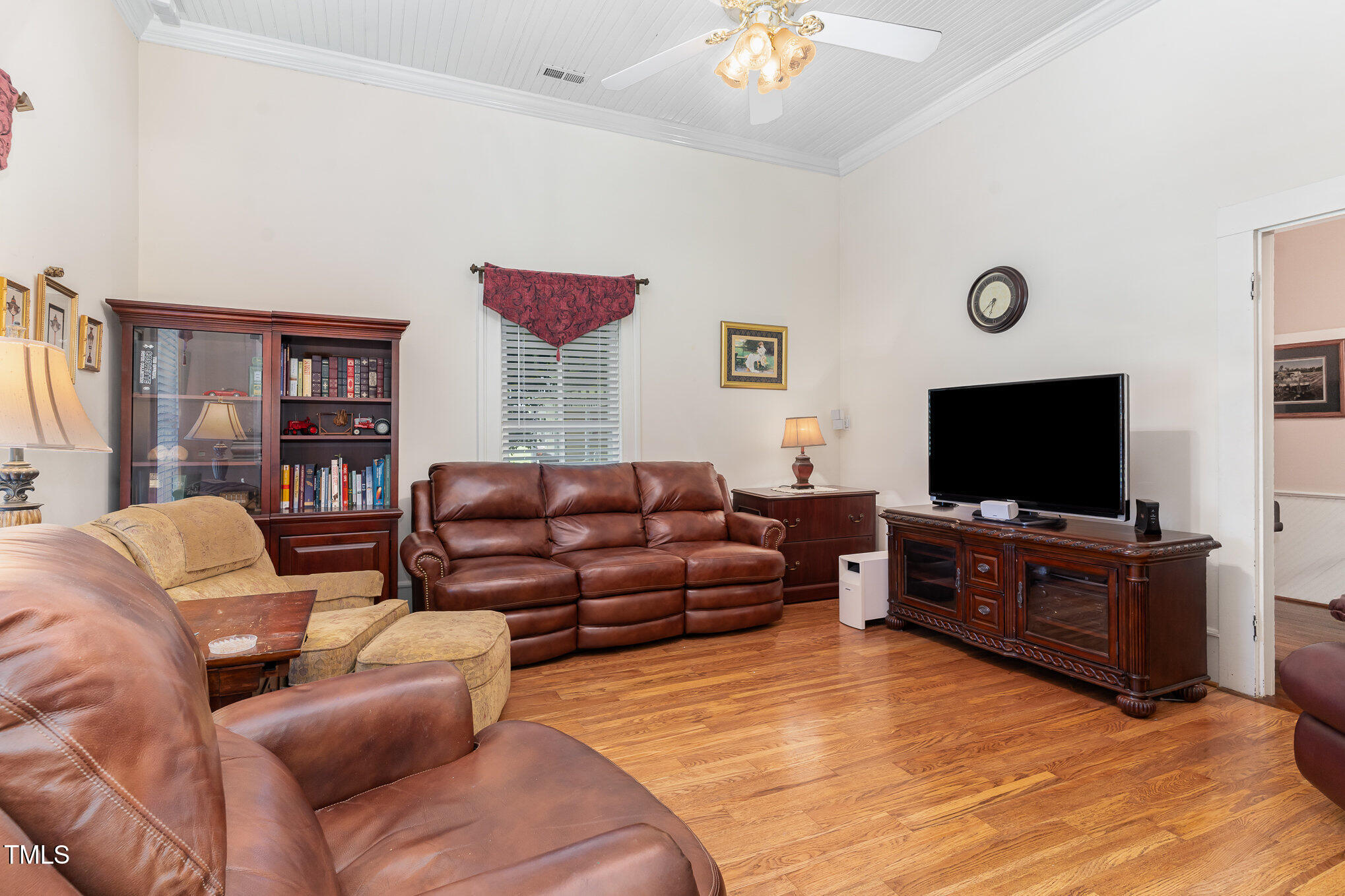 6200 Highway 401 Bunnlevel, NC 28323 - Photo 21 of 28 a living room with furniture and a flat screen tv