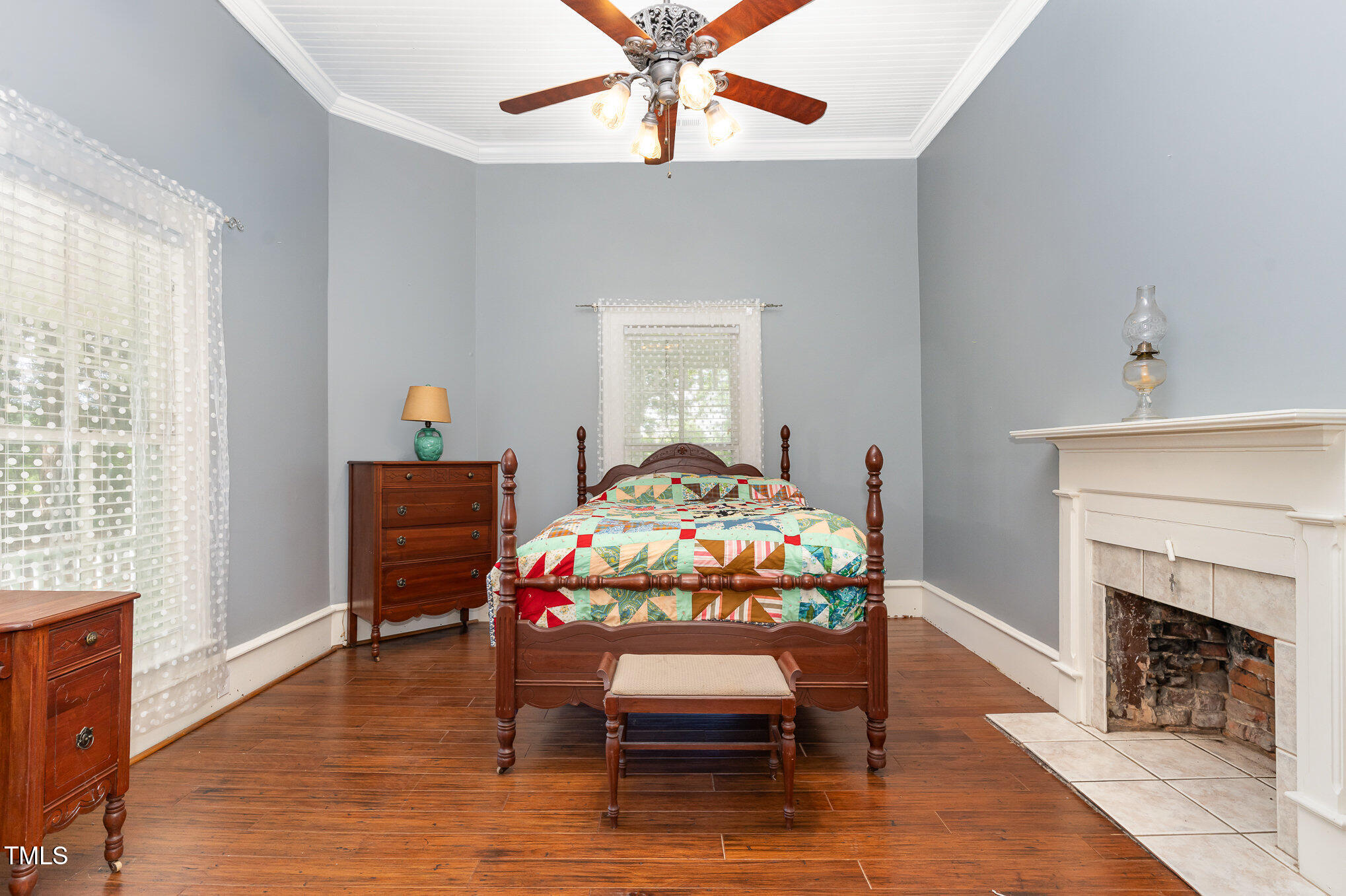 6200 Highway 401 Bunnlevel, NC 28323 - Photo 22 of 28 a bedroom with furniture and a fireplace