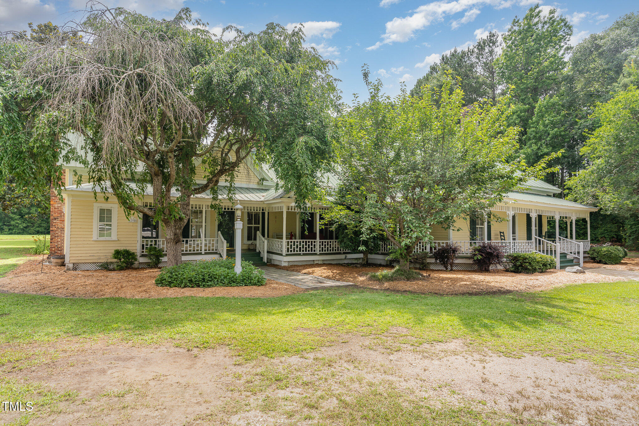6200 Highway 401 Bunnlevel, NC 28323 - Photo 2 of 28 a front view of a house with garden
