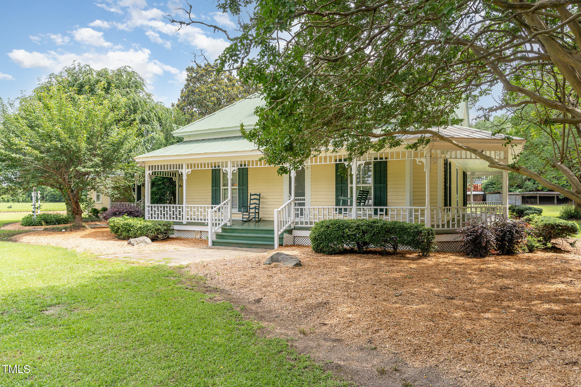 6200 Highway 401 Bunnlevel, NC 28323 - Photo 4 of 28 a front view of a house with yard patio and green space
