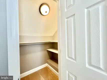 a view of a room with rack on the wall