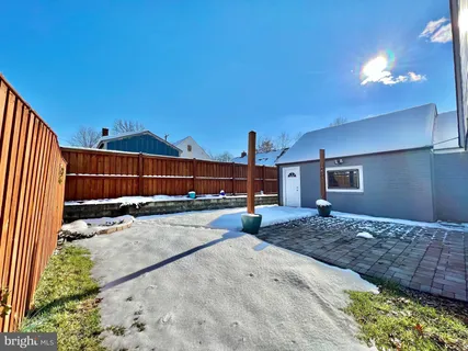 a house view with a backyard space