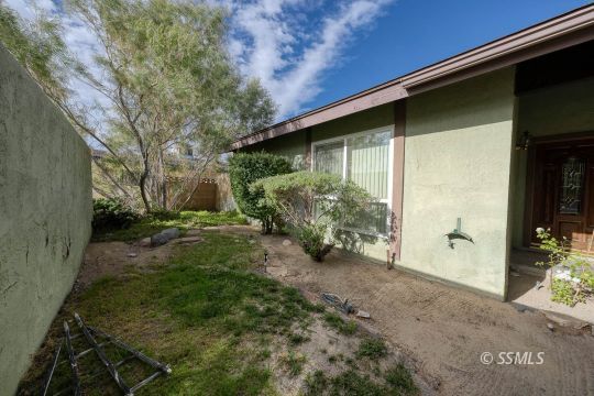 736 Sherri Street Ridgecrest, CA 93555 - Photo 37 of 42 a view of a backyard with plants