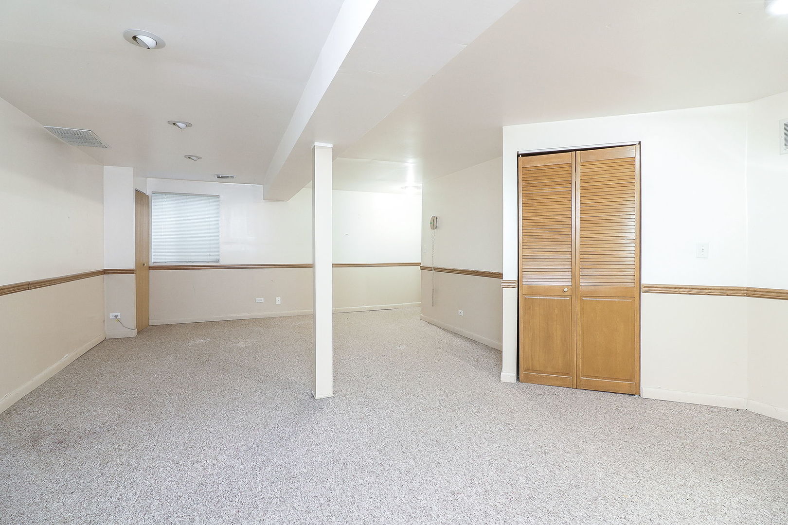 1302 Filly Lane Bartlett, IL 60103 - Photo 26 of 29 a view of an empty room with a window