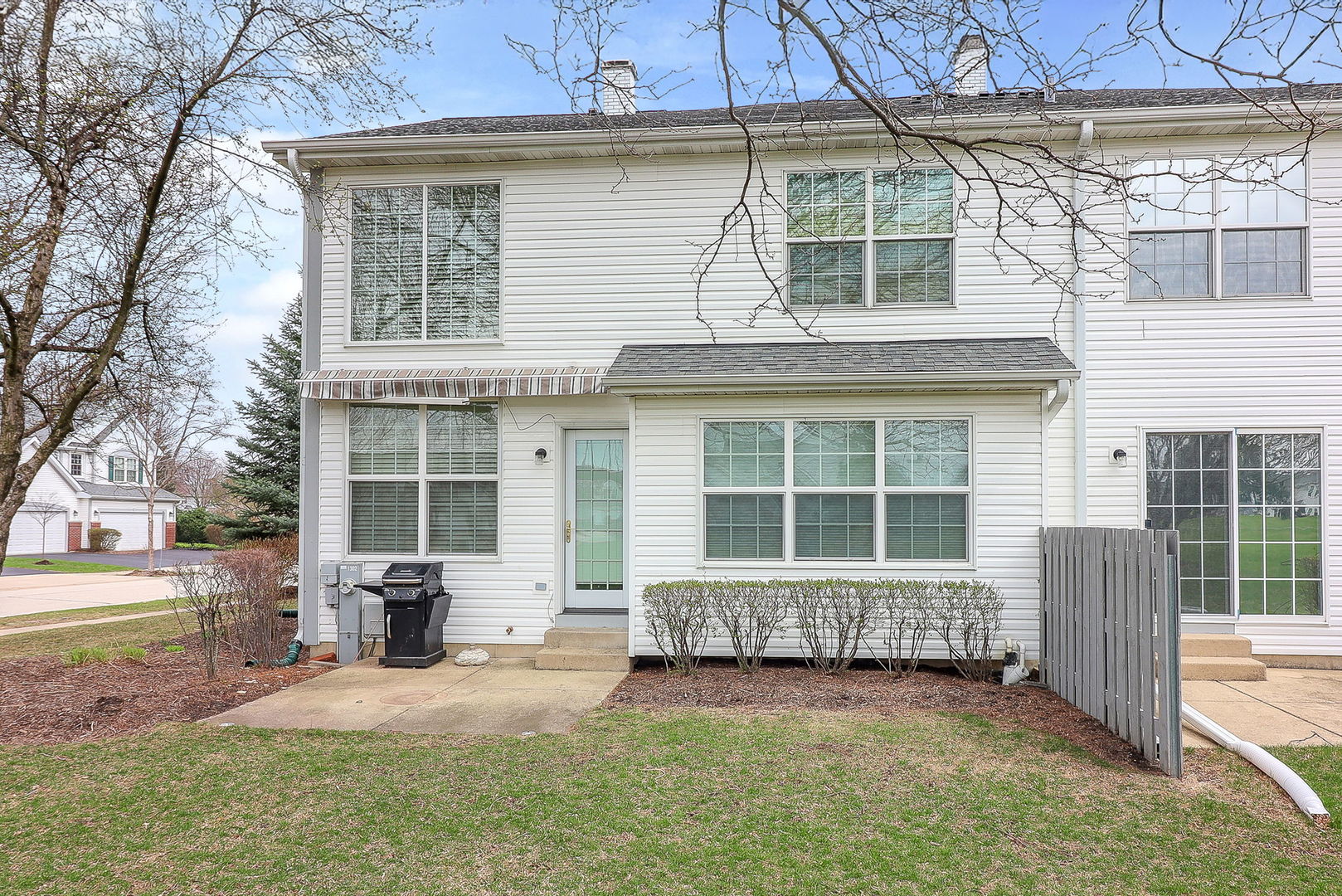 1302 Filly Lane Bartlett, IL 60103 - Photo 6 of 29 a front view of a house with a yard and garage