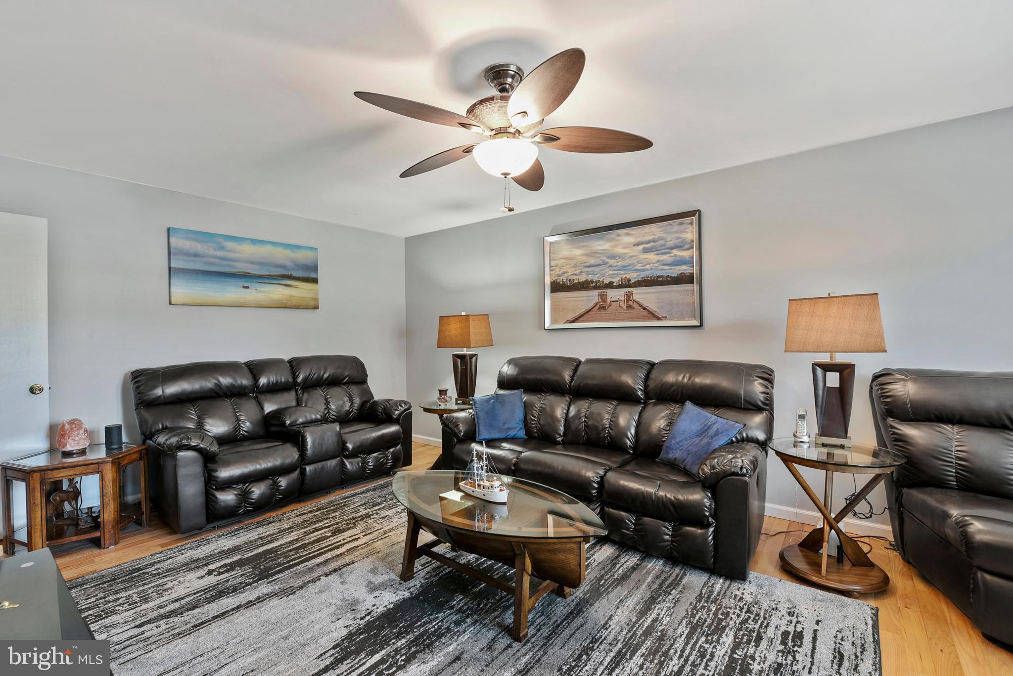 754 Oldfield Point Road Elkton, MD 21921 - Photo 14 of 49 a living room with furniture and a ceiling fan