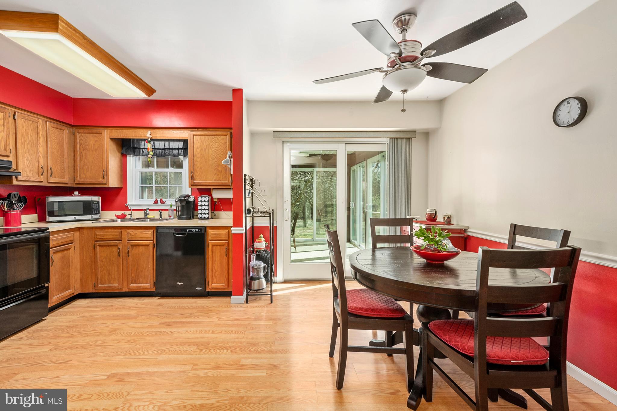 754 Oldfield Point Road Elkton, MD 21921 - Photo 17 of 49 a kitchen with a wooden table and chairs