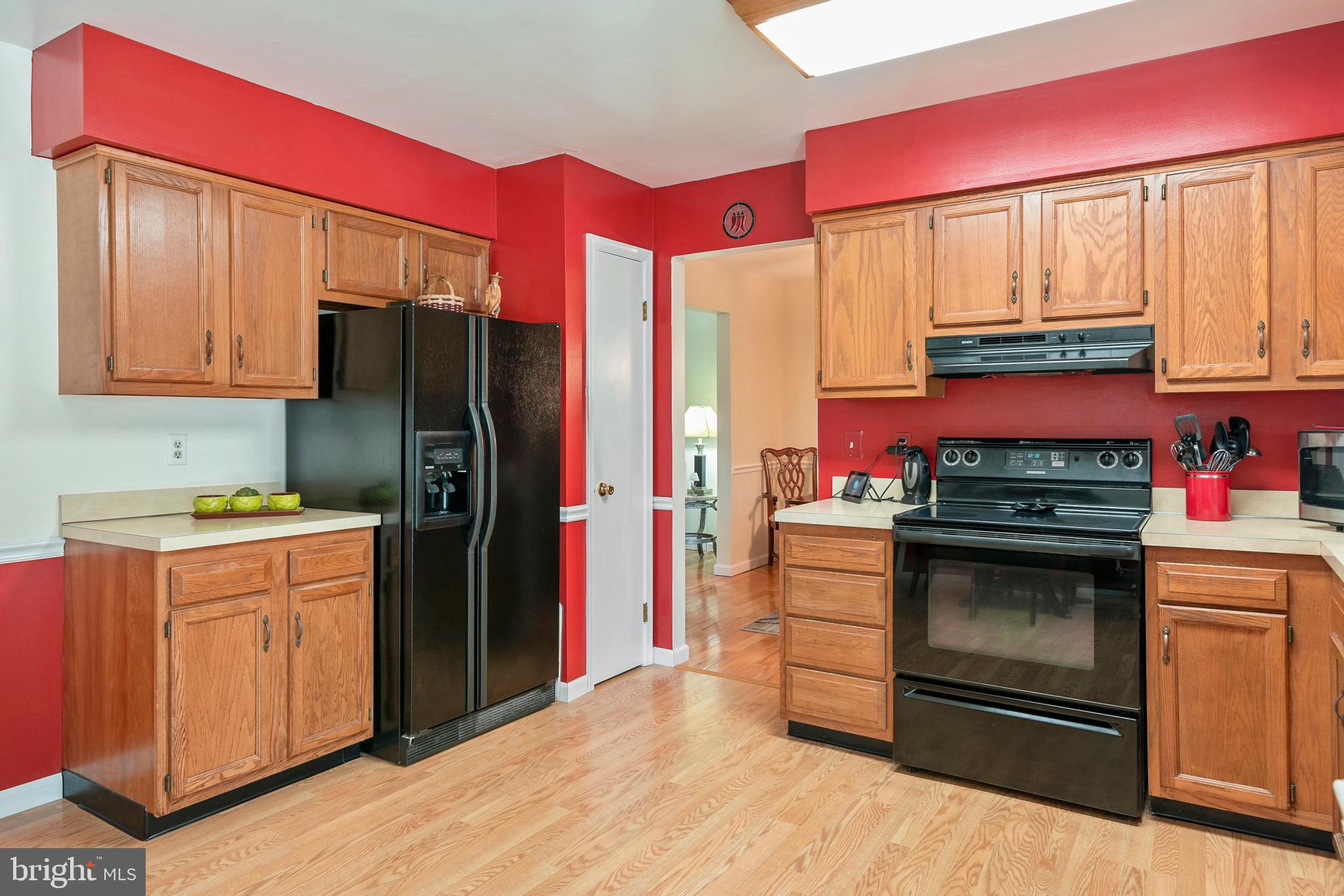 754 Oldfield Point Road Elkton, MD 21921 - Photo 20 of 49 a kitchen with stainless steel appliances granite countertop a refrigerator stove and sink