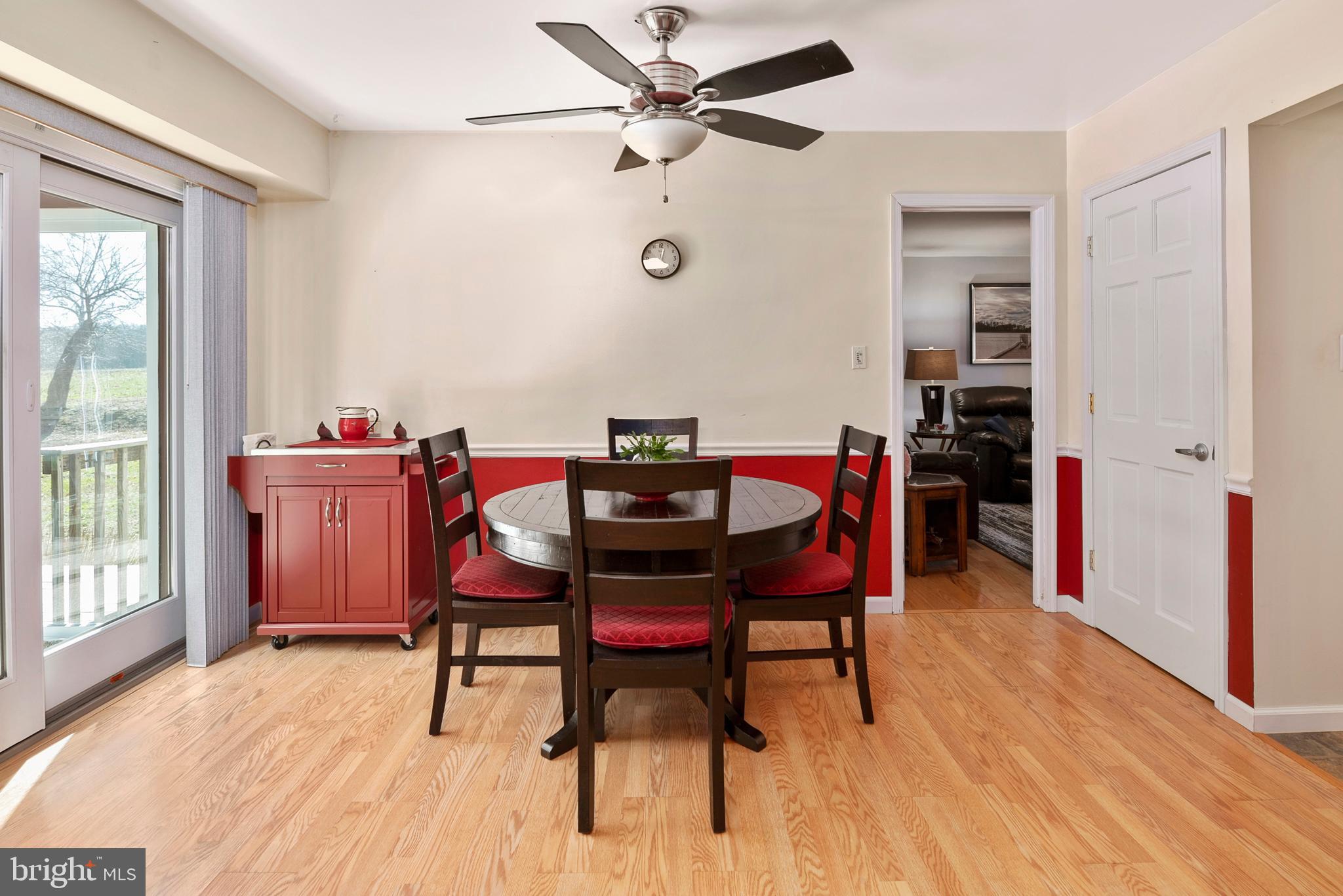 754 Oldfield Point Road Elkton, MD 21921 - Photo 21 of 49 a view of a dining room with furniture and window