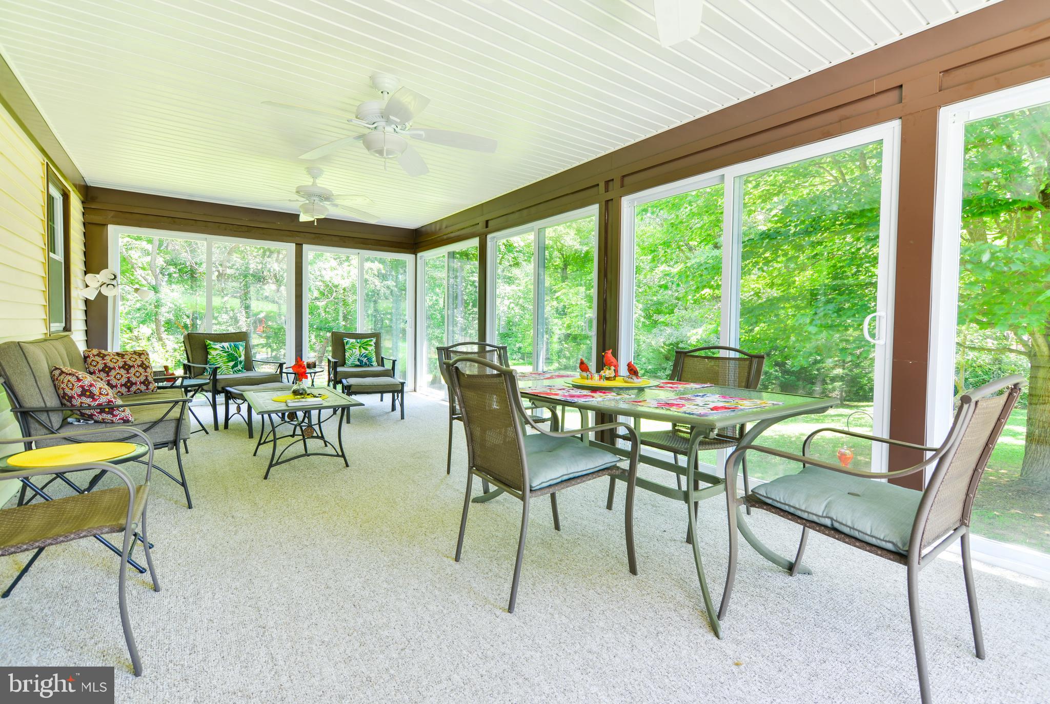 754 Oldfield Point Road Elkton, MD 21921 - Photo 24 of 49 a view of a dining room with furniture window and outside view