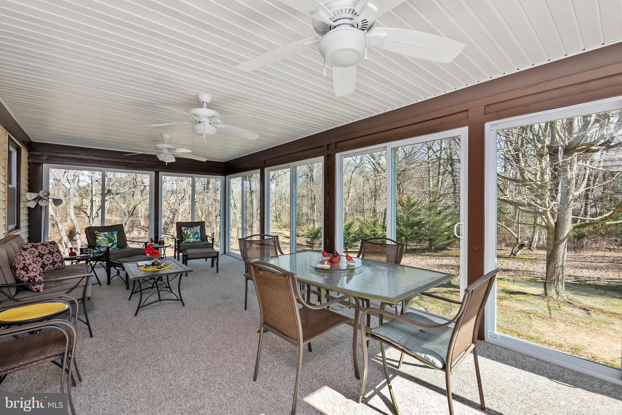 754 Oldfield Point Road Elkton, MD 21921 - Photo 26 of 49 a living room with furniture and a large window