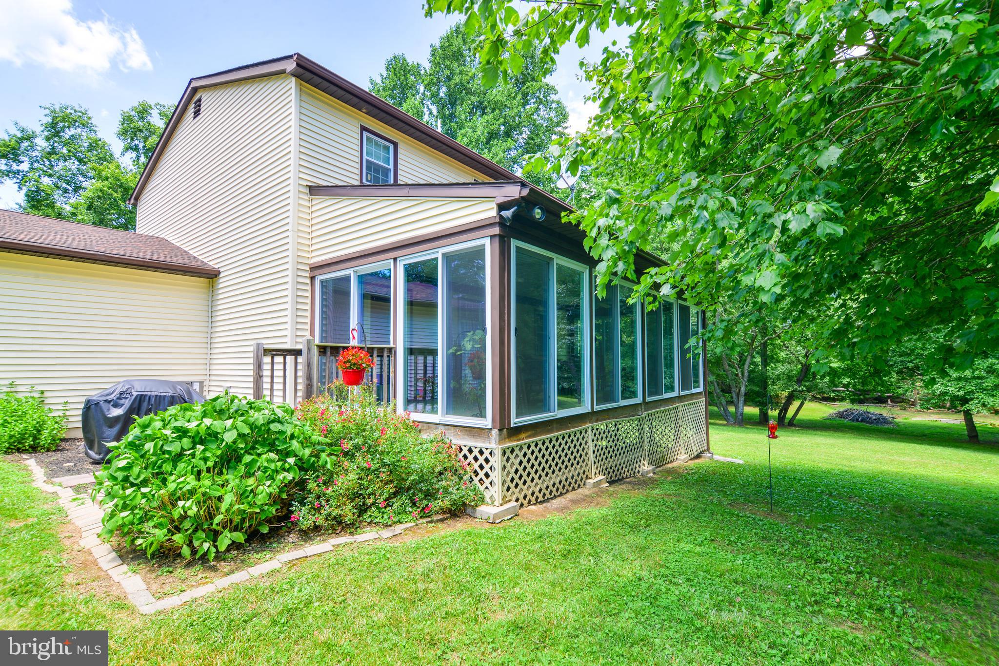 754 Oldfield Point Road Elkton, MD 21921 - Photo 27 of 49 a front view of a house with yard and green space