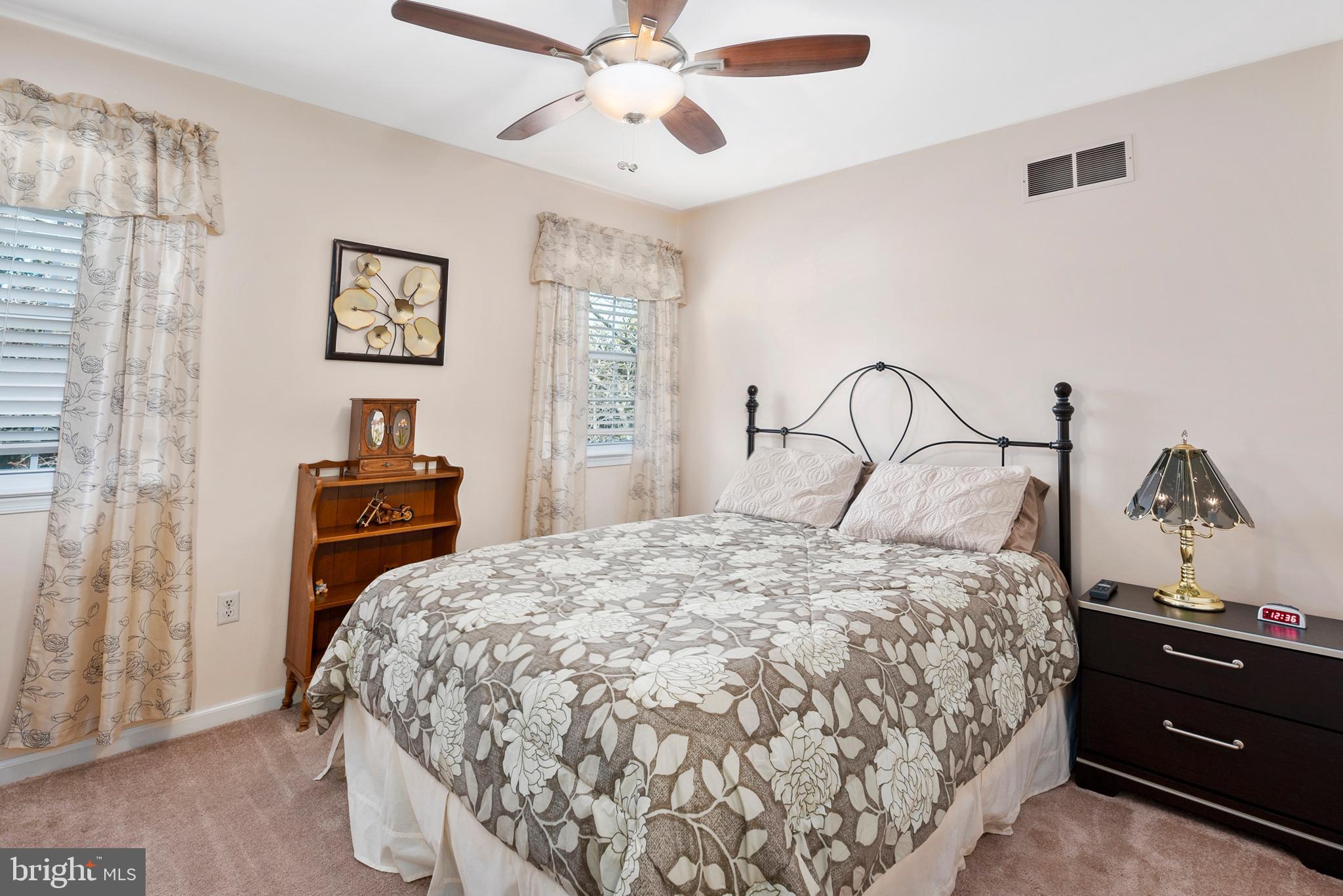 754 Oldfield Point Road Elkton, MD 21921 - Photo 41 of 49 a bedroom with a bed and cabinets