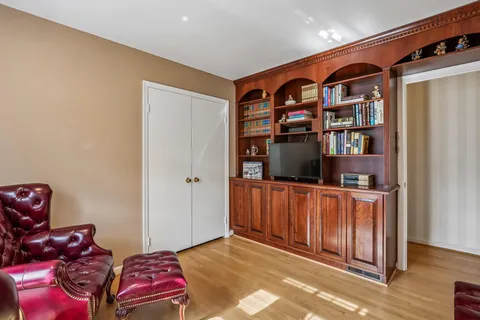 a view of a livingroom with shelves