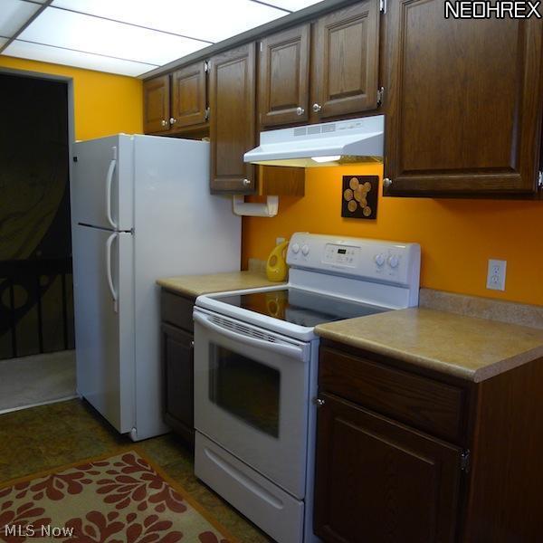 935 Hampton Ridge Drive Akron, OH 44313 - Photo 9 of 23 Updated appliances and new floor in kitchen.