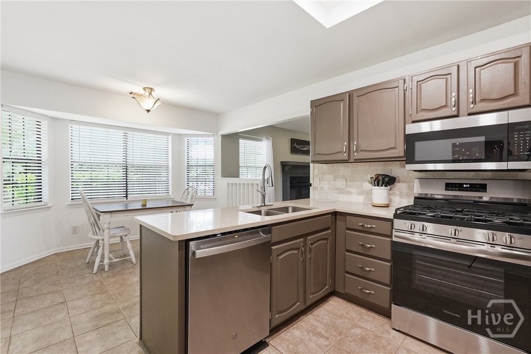 3 Rice Mill Drive Savannah, GA 31419 - Photo 10 of 37 Kitchen includes a cozy and bright breakfast nook.