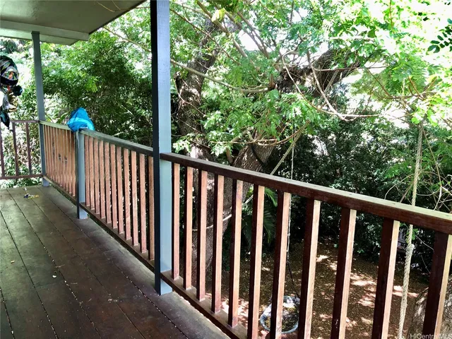 a view of a wooden street from a balcony