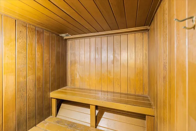 a bathroom with a sink and shower curtain