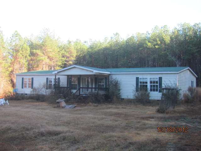 133 Morris Stevens Road Macon, GA 31217 - Photo 1 of 1 a view of a house with a backyard