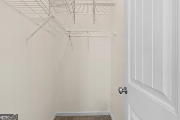 a view of a room with rack on the wall
