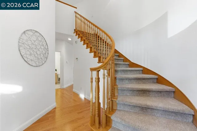 a view of entryway with wooden floor