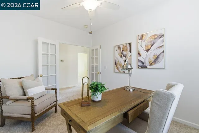 a view of a dining room with furniture