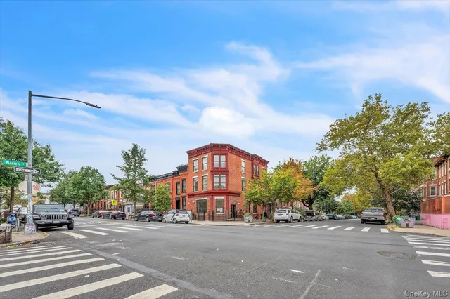 a view of a city street from a building
