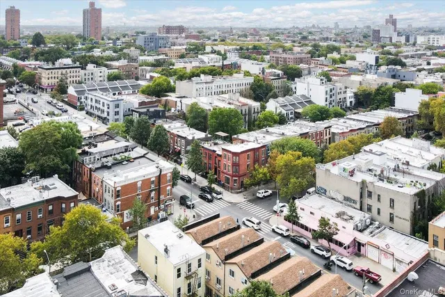 an aerial view of a city with lots of residential buildings