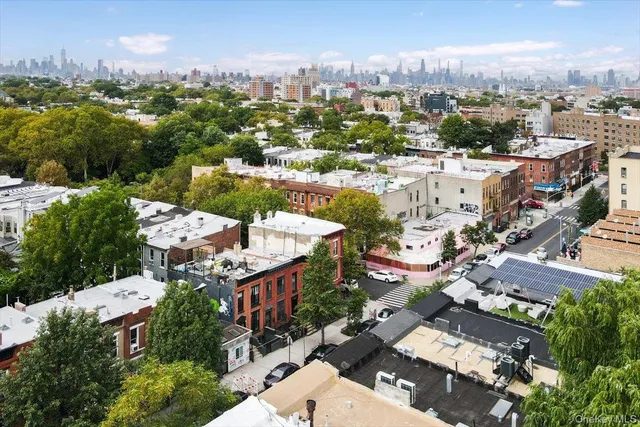 an aerial view of a city with lots of residential buildings