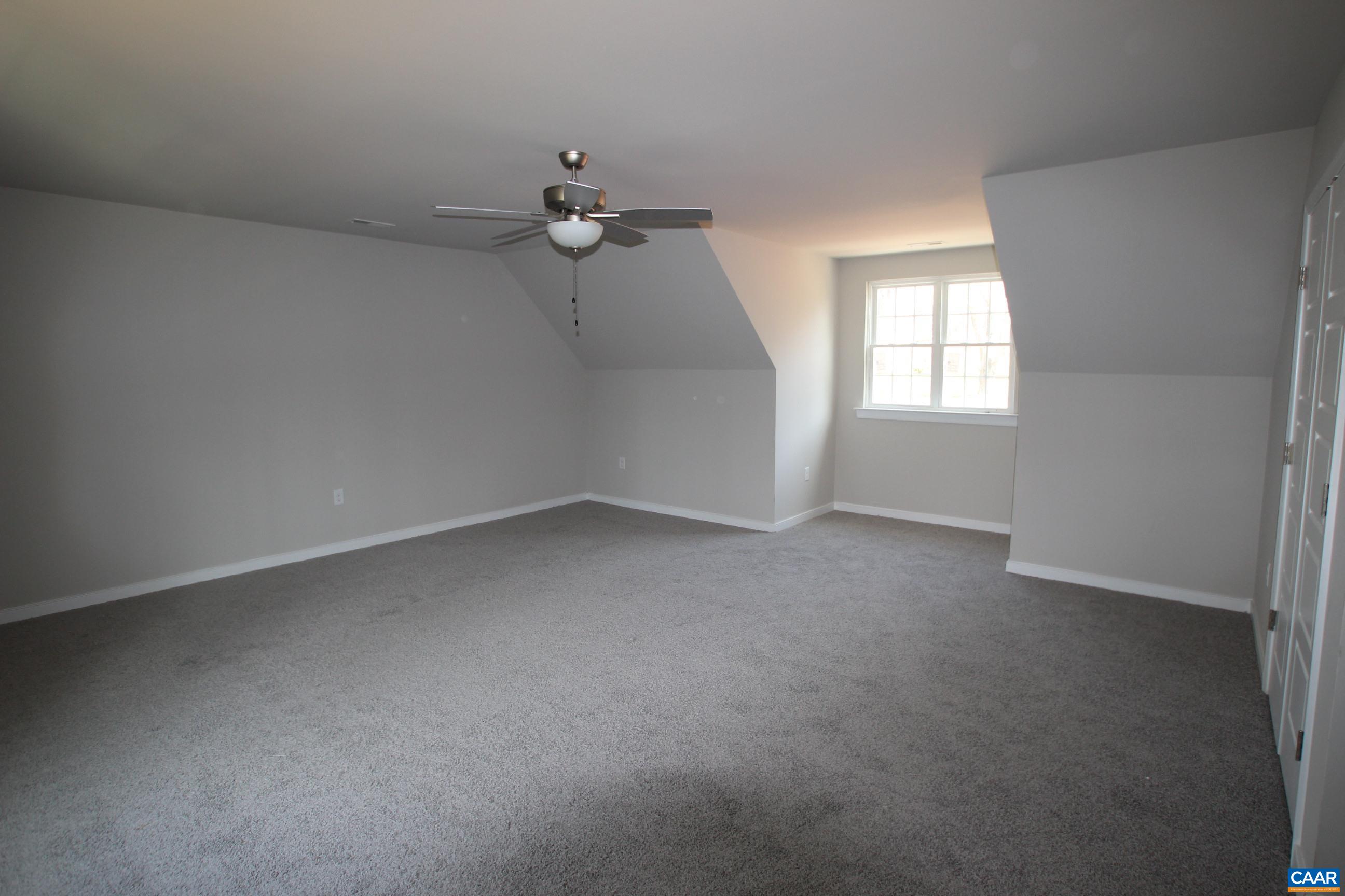 562 Pasture Lane Ruckersville, VA 22968 - Photo 23 of 37 an empty room with a window