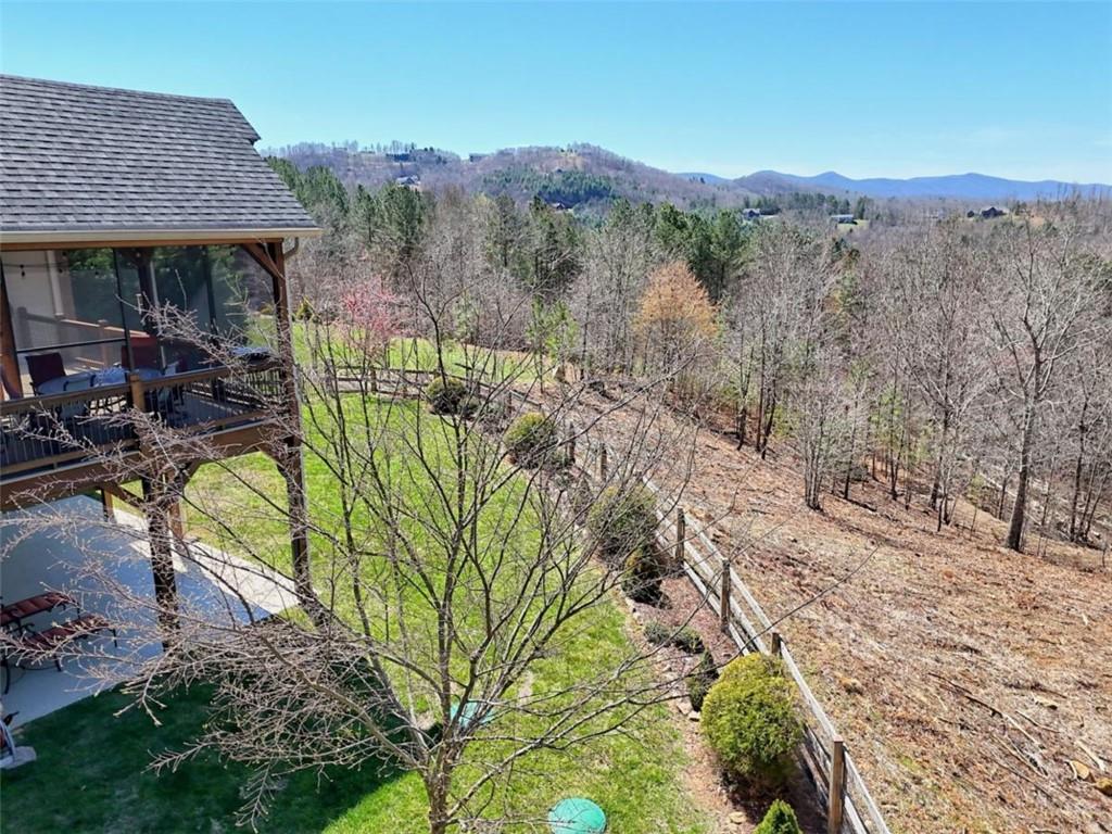 899 Ridge Pointe Way Blairsville, GA 30512 - Photo 88 of 88 a view of a chairs and table in the patio