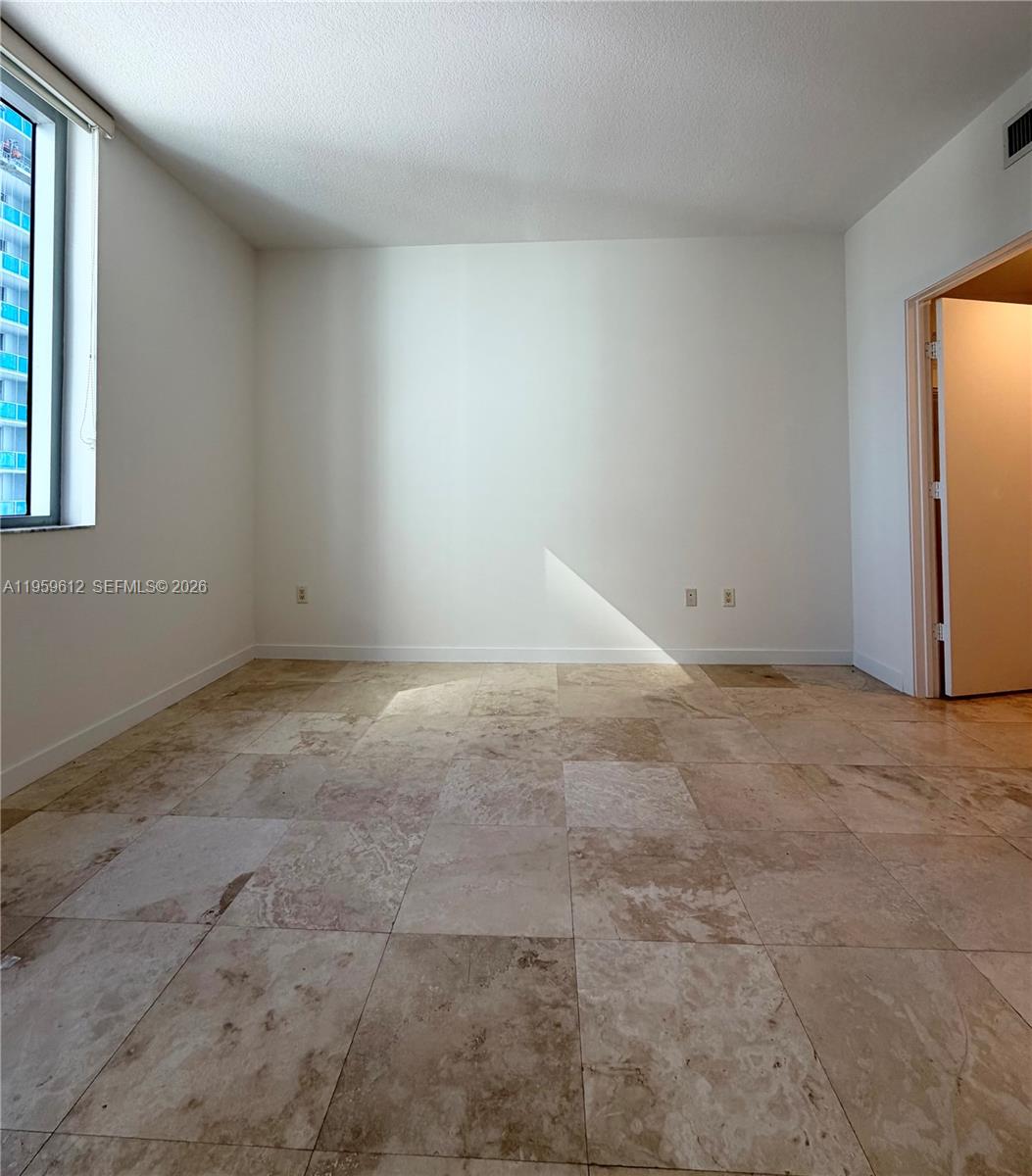 1060 Brickell Avenue, Unit 2113 Miami, FL 33131 - Photo 27 of 52 a view of an empty room