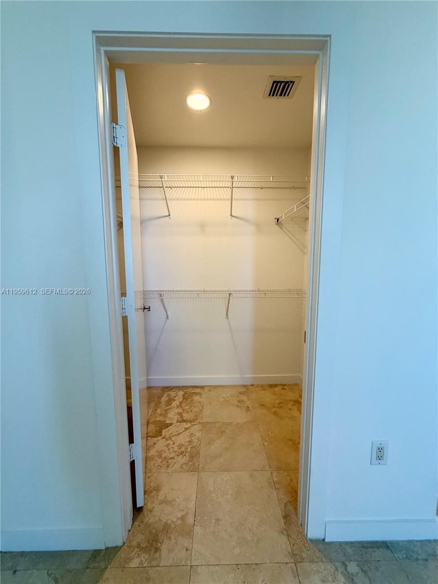 1060 Brickell Avenue, Unit 2113 Miami, FL 33131 - Photo 31 of 52 a bathroom with a shower