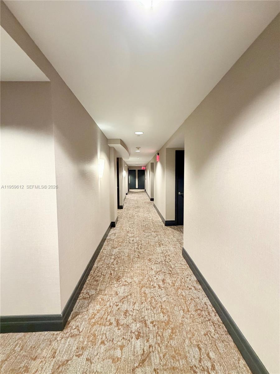 1060 Brickell Avenue, Unit 2113 Miami, FL 33131 - Photo 35 of 52 a view of a big room with closet and windows