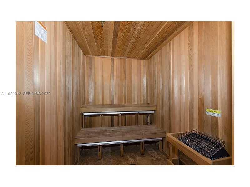 1060 Brickell Avenue, Unit 2113 Miami, FL 33131 - Photo 47 of 52 a bathroom with a sink and a shower curtain