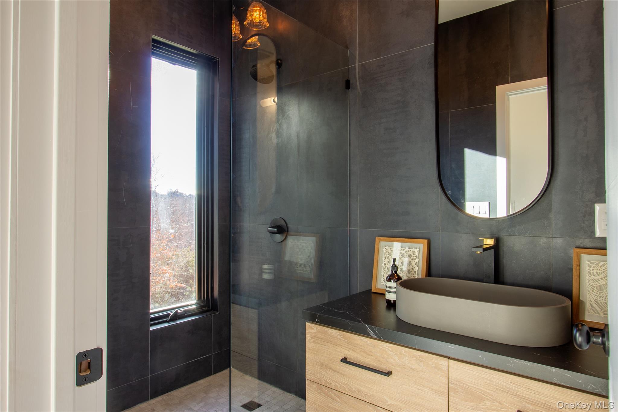 490 Old State Route 82 Craryville, NY 12521 - Photo 21 of 32 a bathroom with a sink a mirror and a shower