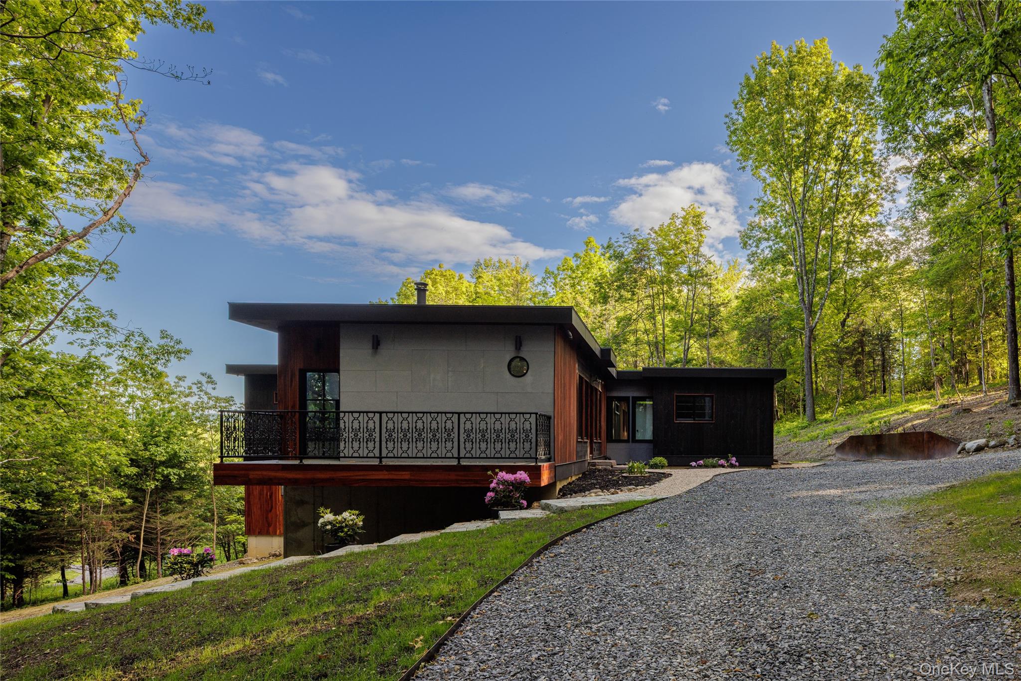 490 Old State Route 82 Craryville, NY 12521 - Photo 31 of 32 a front view of a house with a yard and garage
