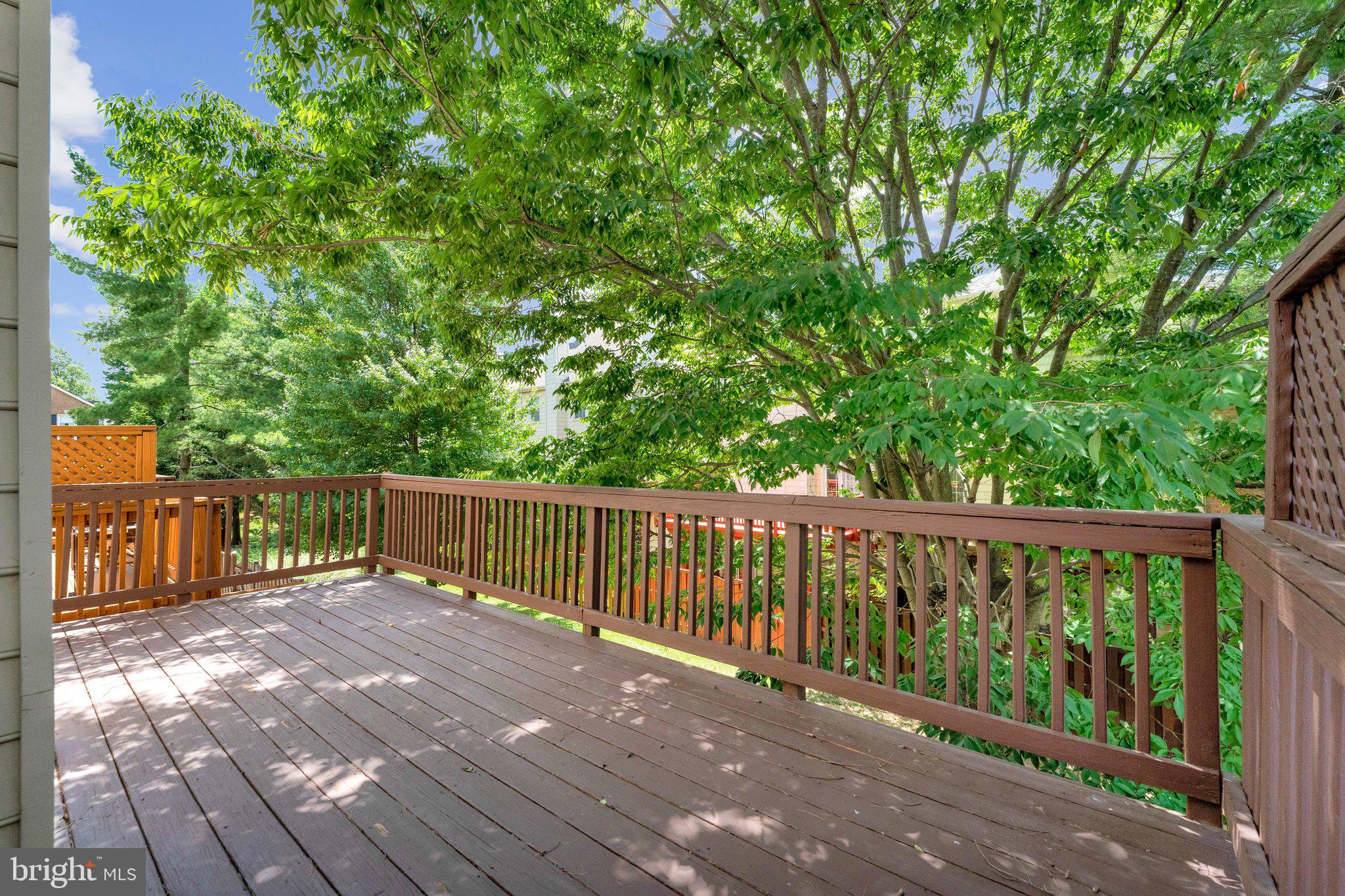 2000 Gallows Tree Lane Vienna, VA 22182 - Photo 48 of 58 a balcony with trees in front of it