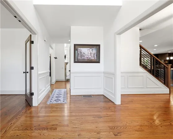a view of entryway with wooden floor