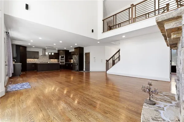 a view of a living room with a kitchen